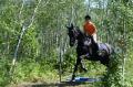 Sarah_riding_Victor_cross_country_2